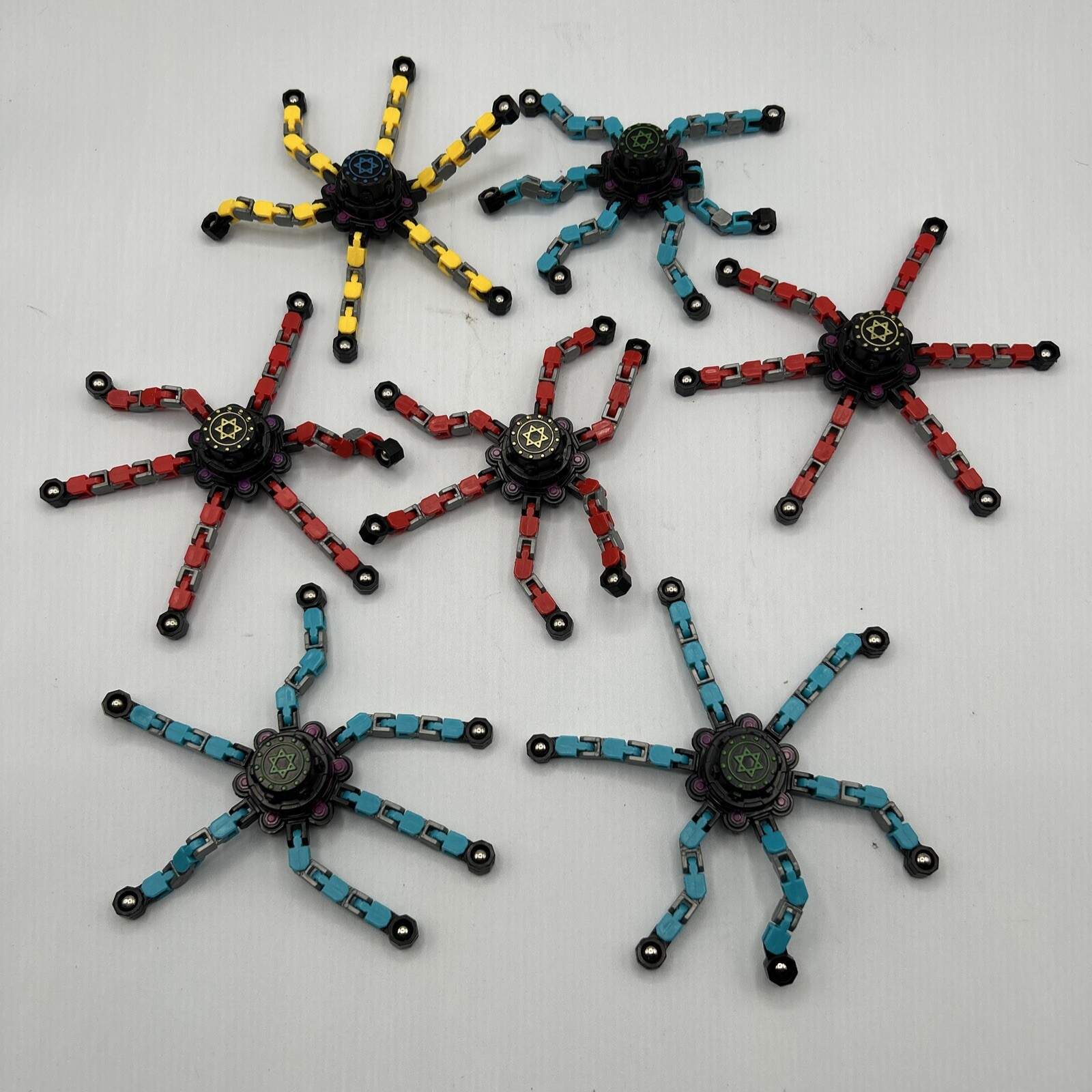 7 Pcs Fidget Finger Spinner Sensory Toy Creative Transformable Chain Robot Used